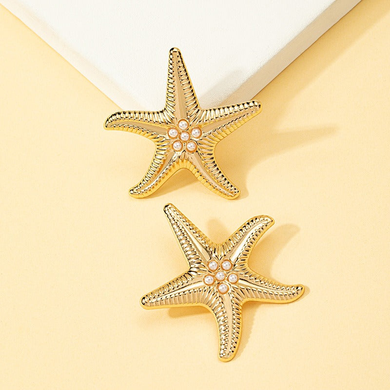 Boucles d'oreilles étoile de Mer minimalistes