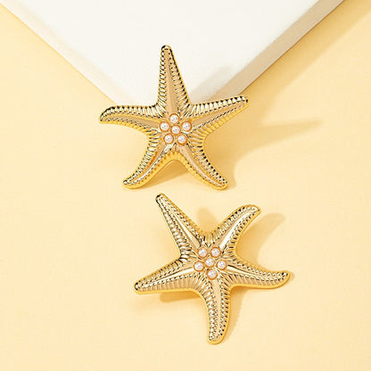 Boucles d'oreilles étoile de Mer minimalistes