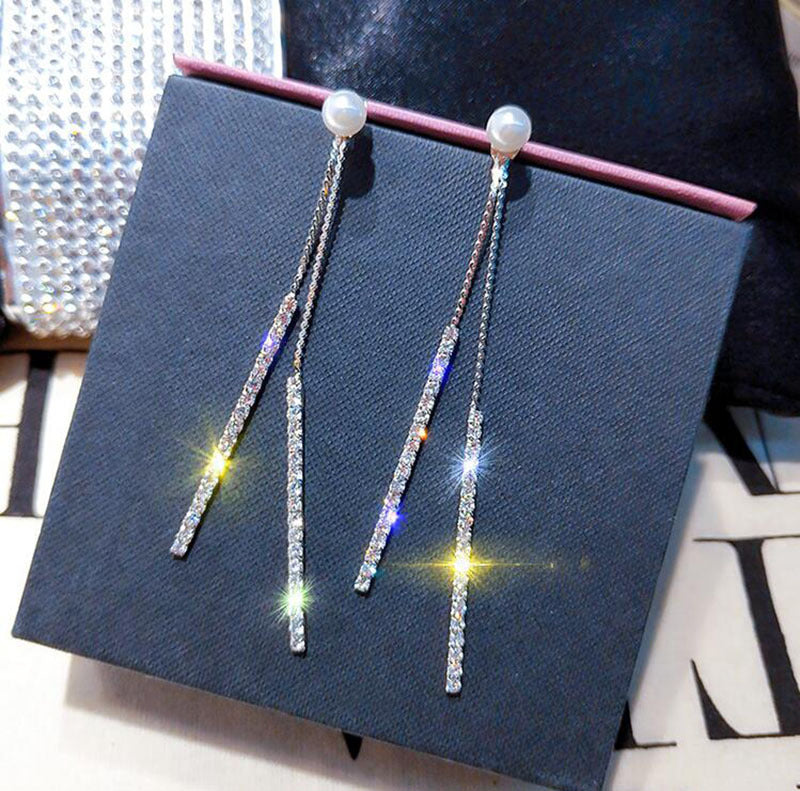 Boucles d'oreilles longues perles & pompons