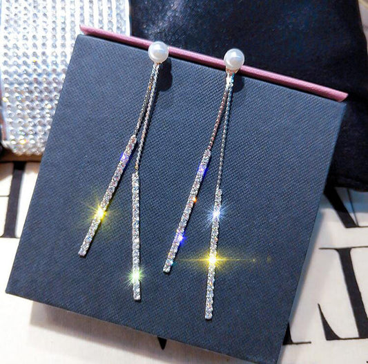 Boucles d'oreilles longues perles & pompons