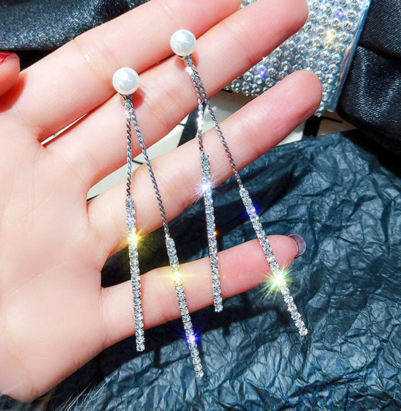 Boucles d'oreilles longues perles & pompons