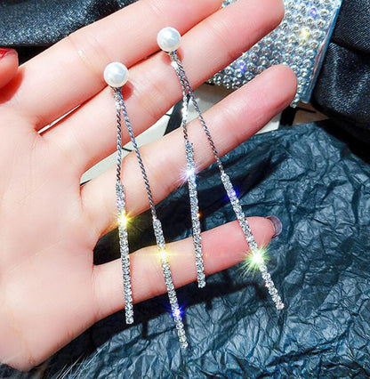 Boucles d'oreilles longues perles & pompons